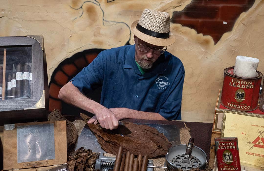 Bradley rolls cigars at Fumar Cigars in Phoenix