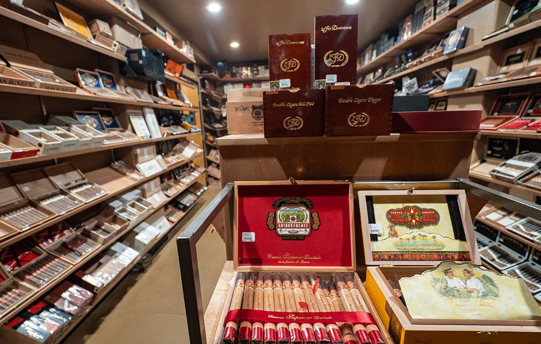 In stock cigars inside the walk-in humidor at Fumar Cigars