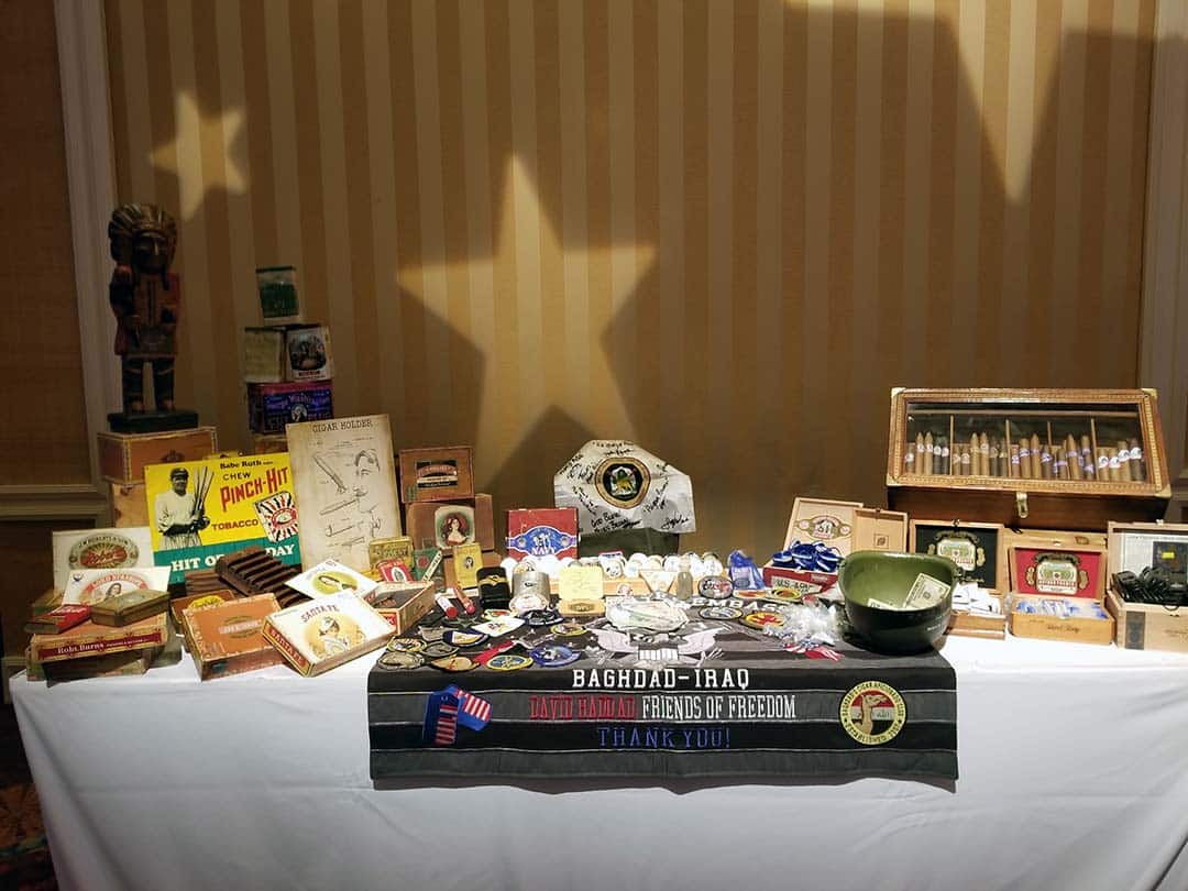 Military tribute cigar bar display at an event