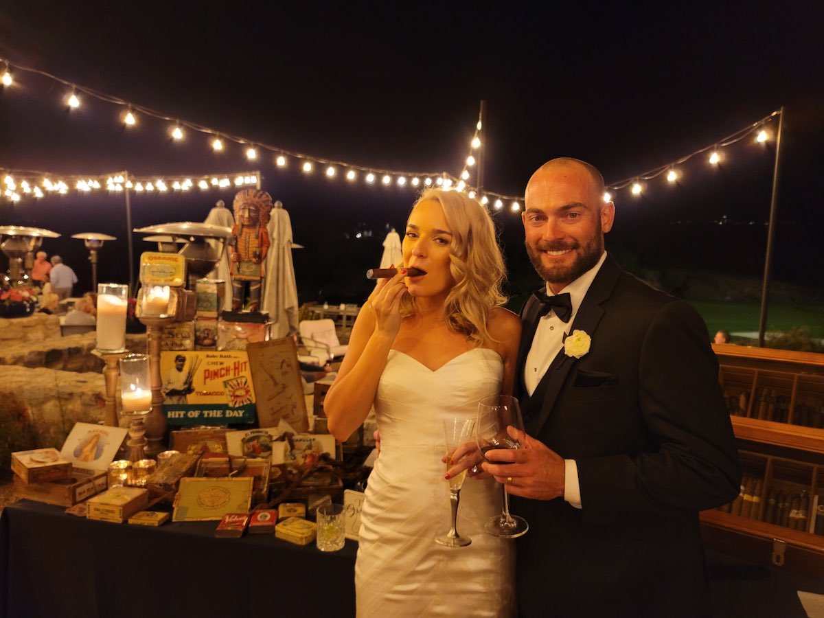 Married Couple at Wedding Reception With Cigar Bar